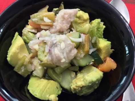 Primed Kinilaw with extra vegetables over avocado chunks